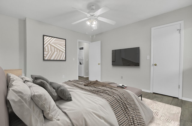 bedroom with hardwood / wood-style floors and ceiling fan