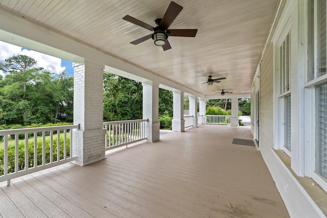 wooden terrace with ceiling fan