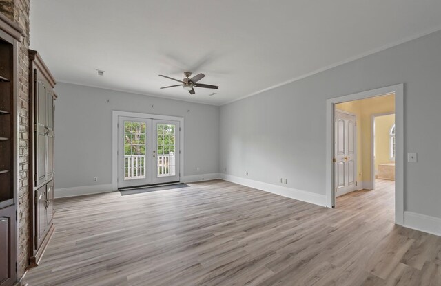 unfurnished room with light hardwood / wood-style floors, french doors, crown molding, and ceiling fan