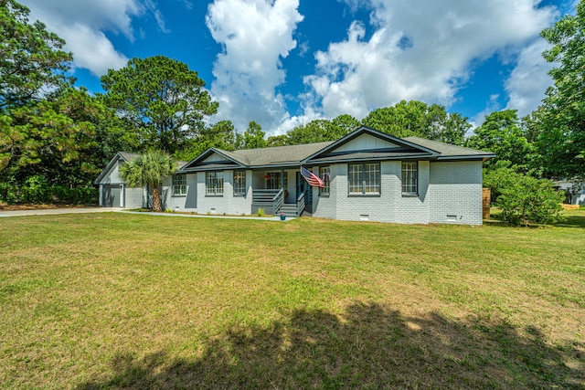 ranch-style house featuring a front lawn