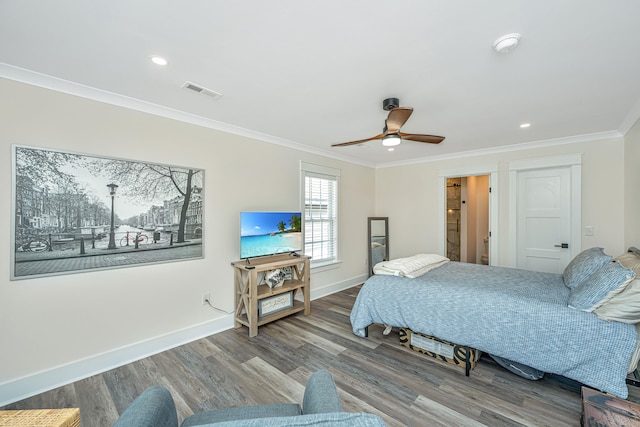 bedroom with ceiling fan, hardwood / wood-style flooring, and crown molding