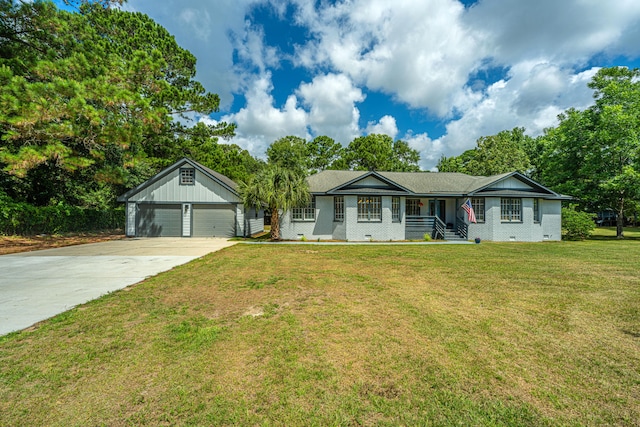 ranch-style home with an outdoor structure, a garage, and a front lawn