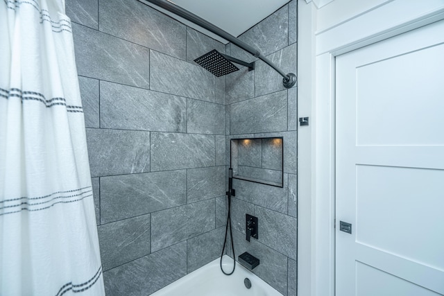 bathroom with shower / bathtub combination with curtain