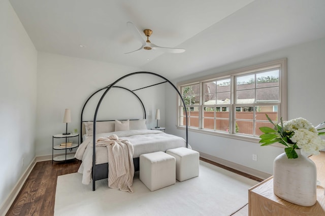 bedroom featuring wood-type flooring and ceiling fan