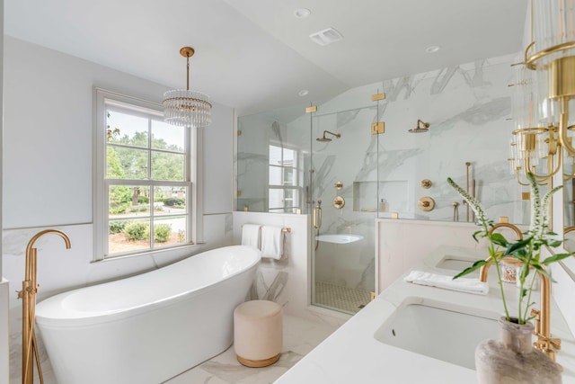 bathroom featuring vanity, tile walls, shower with separate bathtub, and a chandelier