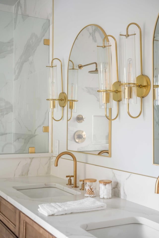 bathroom featuring vanity and walk in shower