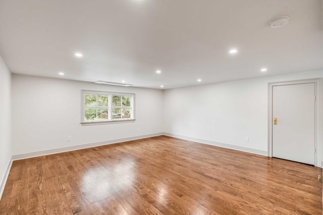 spare room featuring light hardwood / wood-style floors