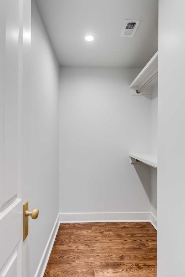 spacious closet with wood-type flooring