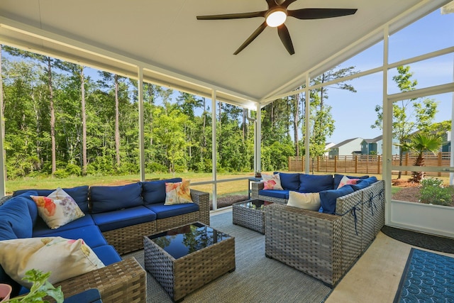 sunroom / solarium featuring an outdoor hangout area, ceiling fan, and vaulted ceiling