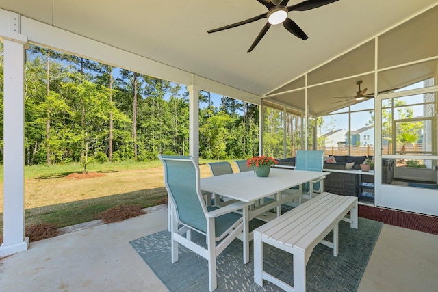 view of patio / terrace with a ceiling fan, outdoor dining space, and an outdoor hangout area