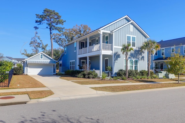 view of front of house featuring a garage and a balcony