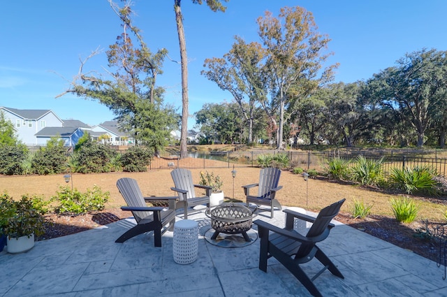 view of patio featuring an outdoor fire pit