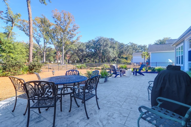 view of patio featuring a fire pit