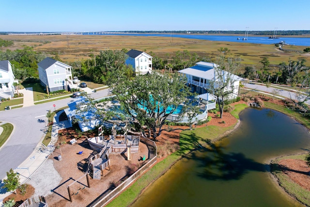 drone / aerial view with a water view