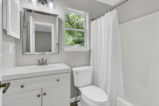 1433 Oaklanding Rd, Mount Pleasant, SC 29464 - bathroom with vanity and shower / tub combo with curtain
