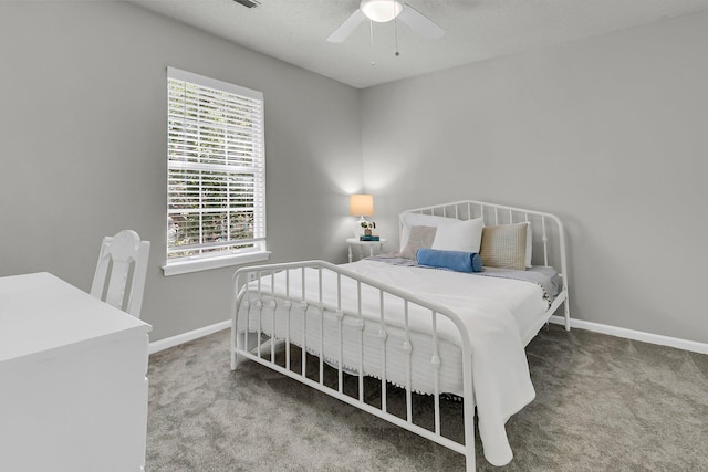 1433 Oaklanding Rd, Mount Pleasant, SC 29464 - carpeted bedroom with baseboards and a ceiling fan