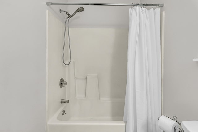 1433 Oaklanding Rd, Mount Pleasant, SC 29464 - bathroom featuring shower / bathtub combination with curtain and toilet