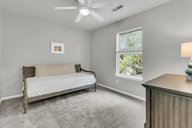 1433 Oaklanding Rd, Mount Pleasant, SC 29464 - carpeted bedroom with multiple windows and ceiling fan