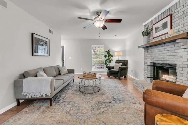 1433 Oaklanding Rd, Mount Pleasant, SC 29464 - tiled living room with a ceiling fan and a fireplace