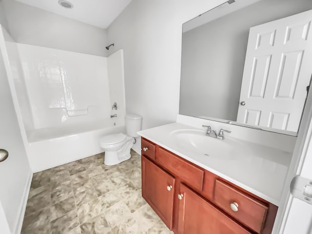 full bathroom featuring vanity, toilet, and  shower combination