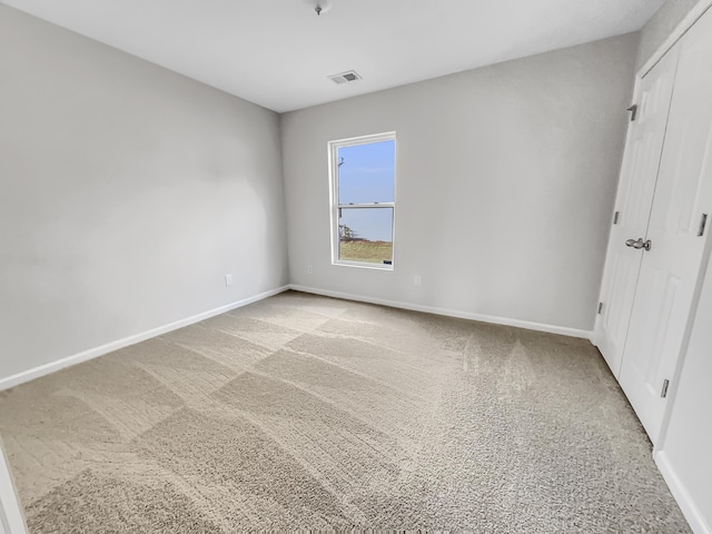 unfurnished bedroom with carpet flooring