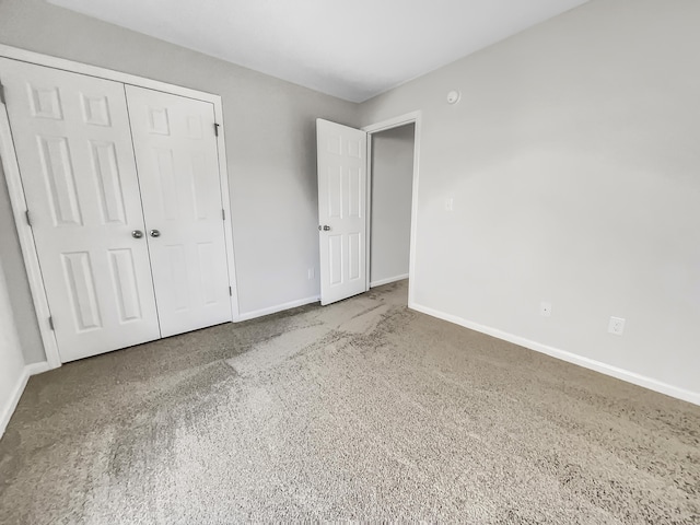 unfurnished bedroom featuring a closet