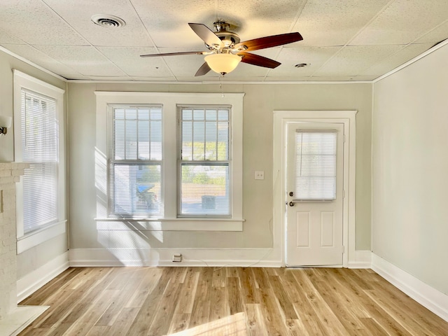 entryway featuring ceiling fan, a healthy amount of sunlight, and light hardwood / wood-style floors