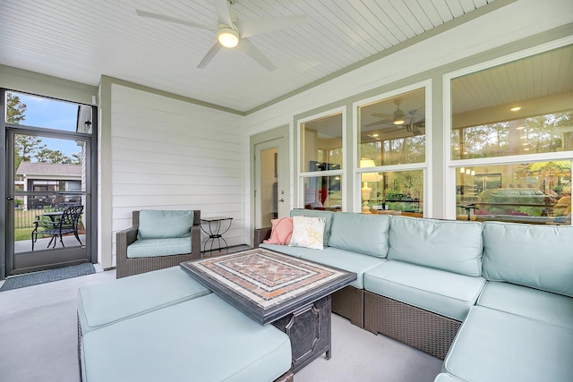 sunroom / solarium with ceiling fan