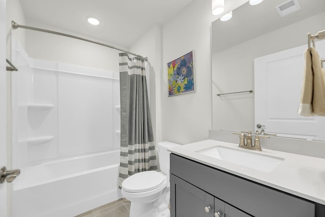 full bathroom featuring shower / bath combo, visible vents, toilet, tile patterned floors, and vanity