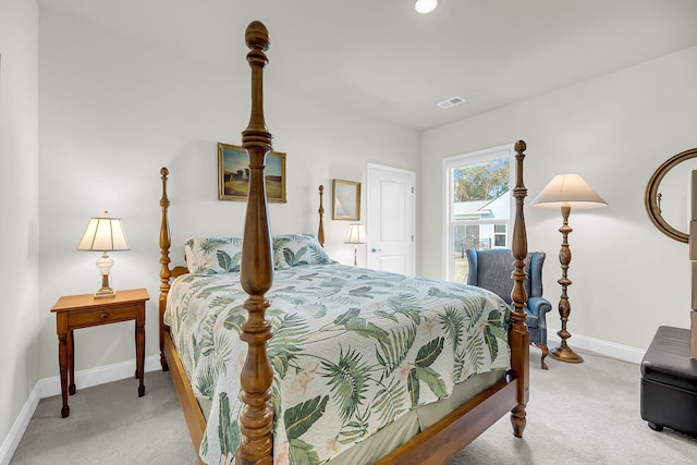 bedroom featuring carpet, visible vents, and baseboards