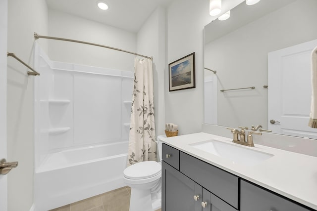 full bathroom featuring shower / bath combination with curtain, tile patterned flooring, vanity, and toilet