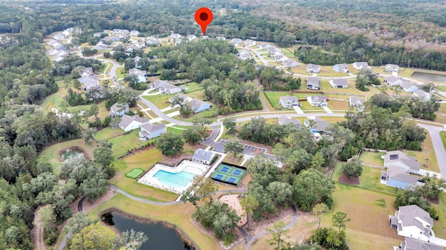 aerial view with a residential view and a forest view