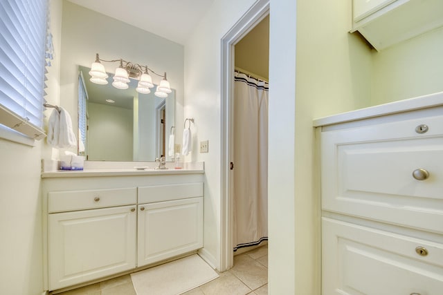 bathroom featuring tile patterned floors and vanity