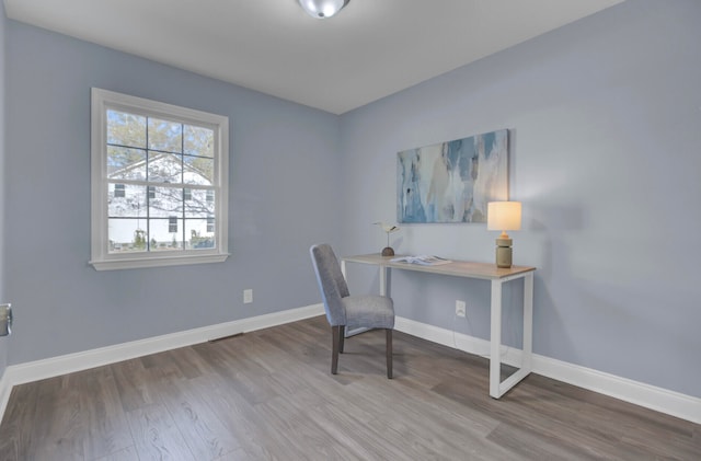 office space featuring hardwood / wood-style floors