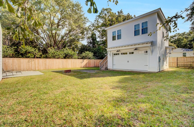 view of yard with a garage