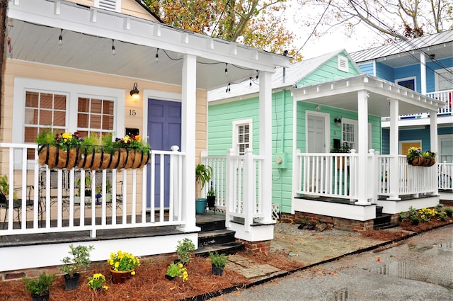 entrance to property with a porch