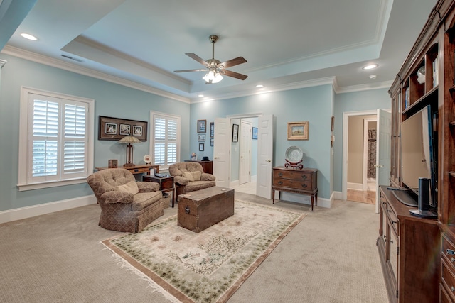 101 Firestone Ct, Summerville, SC 29483 - living room featuring a raised ceiling, light carpet, ceiling fan, ornamental molding, and baseboards