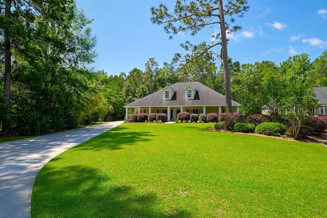 101 Firestone Ct, Summerville, SC 29483 - cape cod house featuring concrete driveway, a front lawn, and covered porch