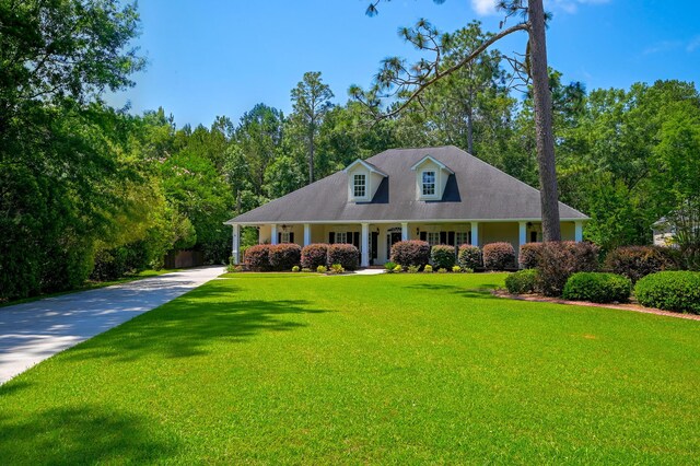 101 Firestone Ct, Summerville, SC 29483 - cape cod house featuring driveway, a front yard, and covered porch
