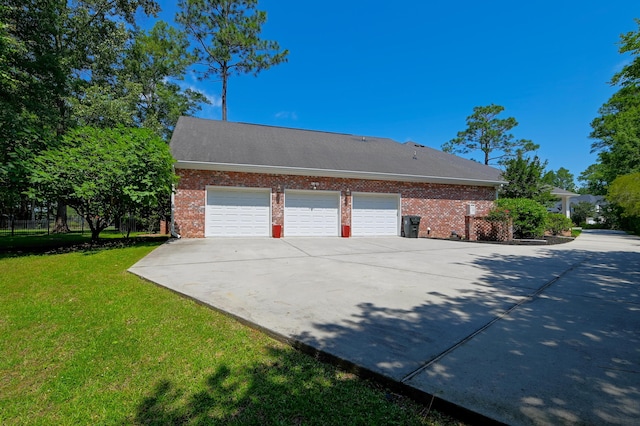 101 Firestone Ct, Summerville, SC 29483 - view of home's exterior with driveway, brick siding, a lawn, and an attached garage