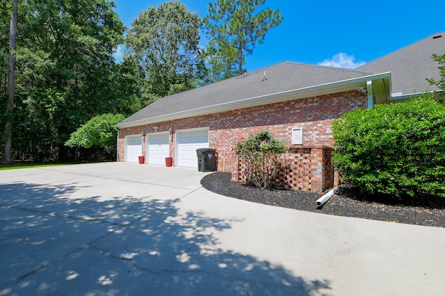 101 Firestone Ct, Summerville, SC 29483 - view of side of property with driveway, brick siding, and a garage