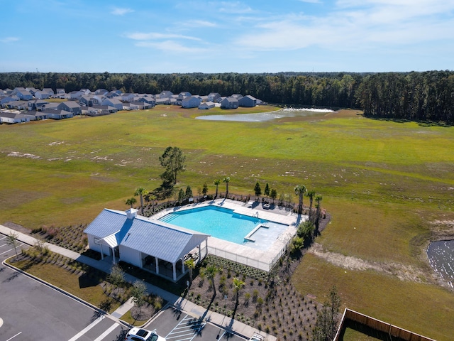 view of swimming pool with a water view