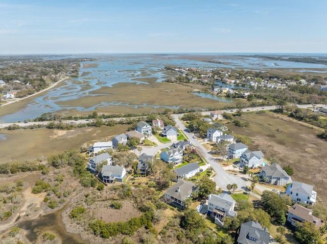 aerial view with a residential view and a water view