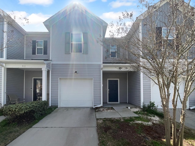 view of front of house featuring driveway and a garage