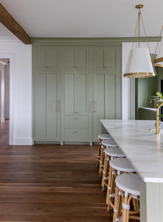 dining space featuring beam ceiling and dark hardwood / wood-style floors