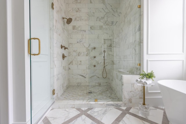 bathroom featuring tile floors and a shower with door