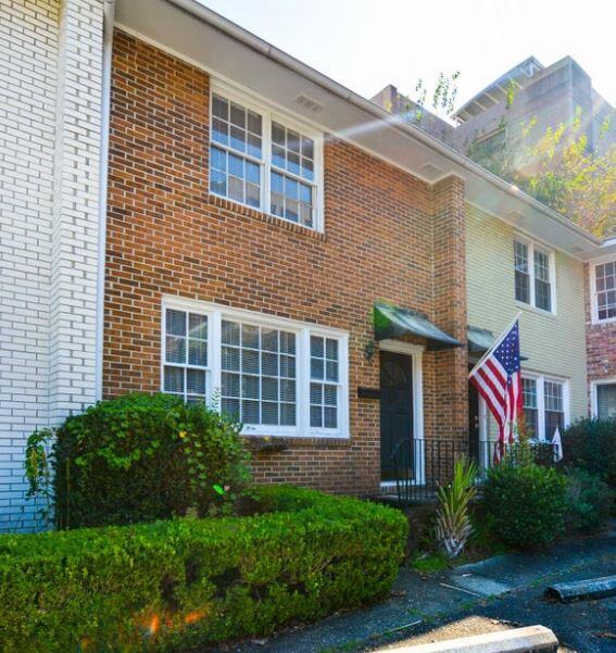 view of front of house with brick siding