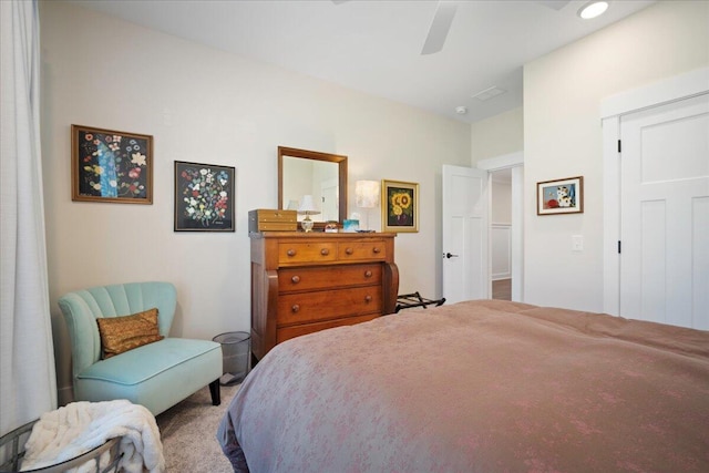 carpeted bedroom with ceiling fan