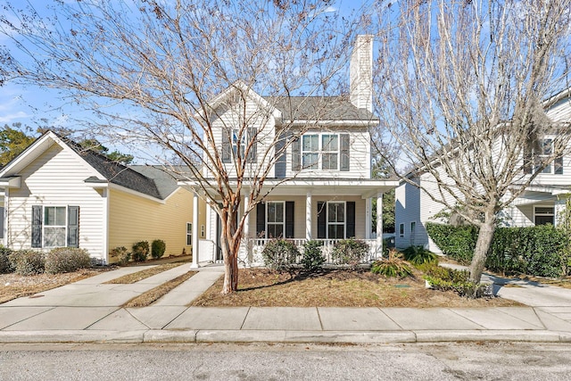 view of property with a porch