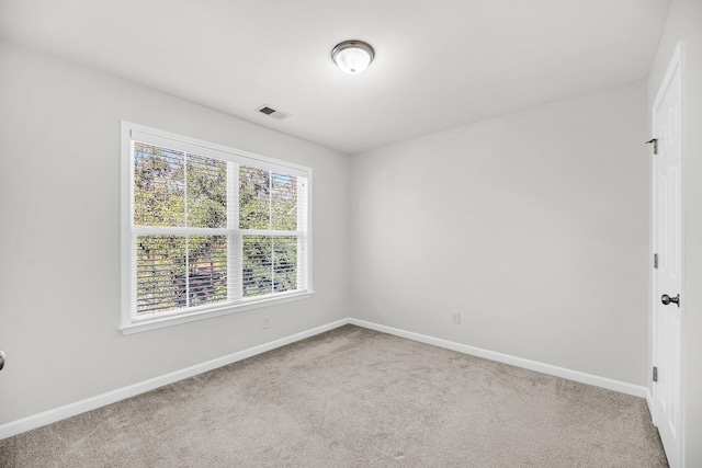 view of carpeted spare room